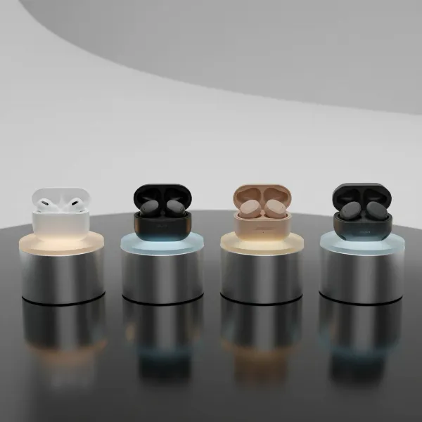 A curated display of several top-rated wireless earbuds (Apple AirPods Pro, Sony WF-1000XM5, Bose QuietComfort Ultra, Jabra Elite 8 Active) showcased on a sleek, modern stand. 